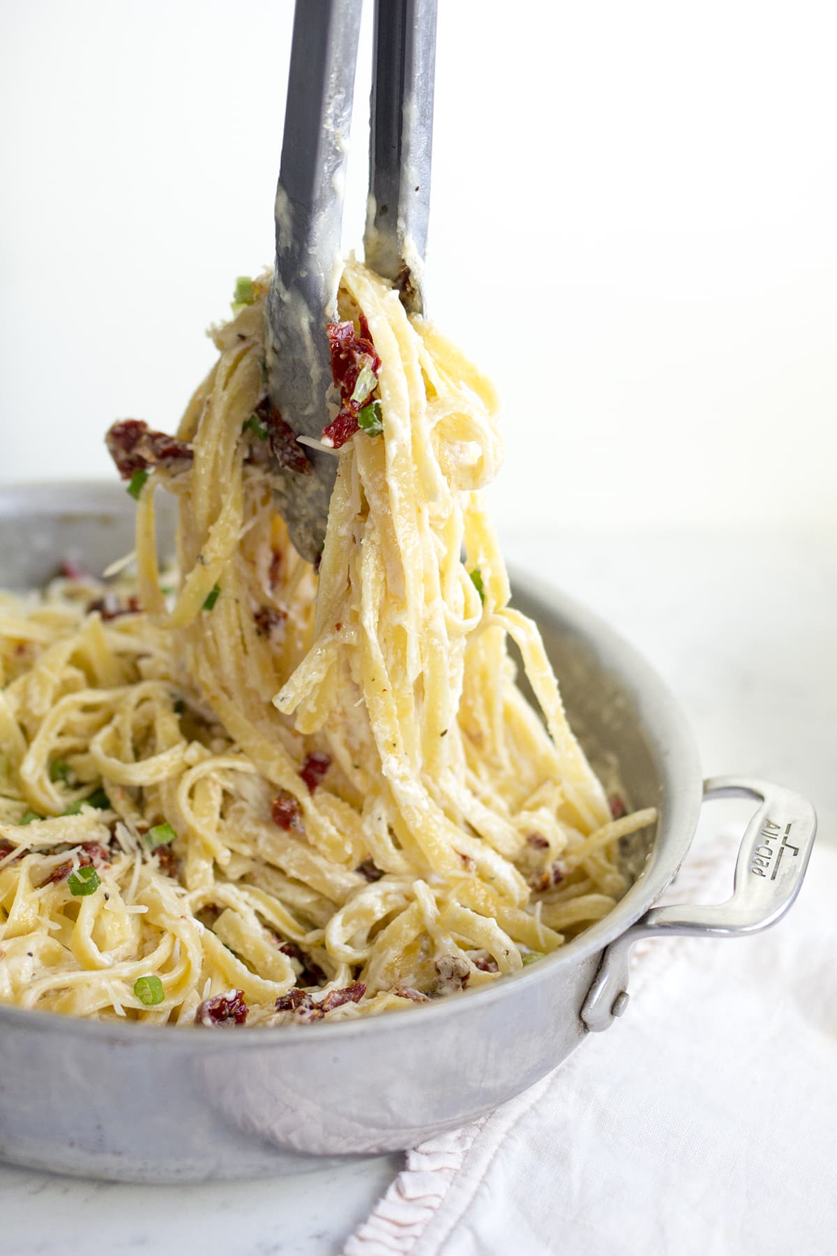 Fettuccine Alfredo with Sun-dried Tomatoes and Scallions