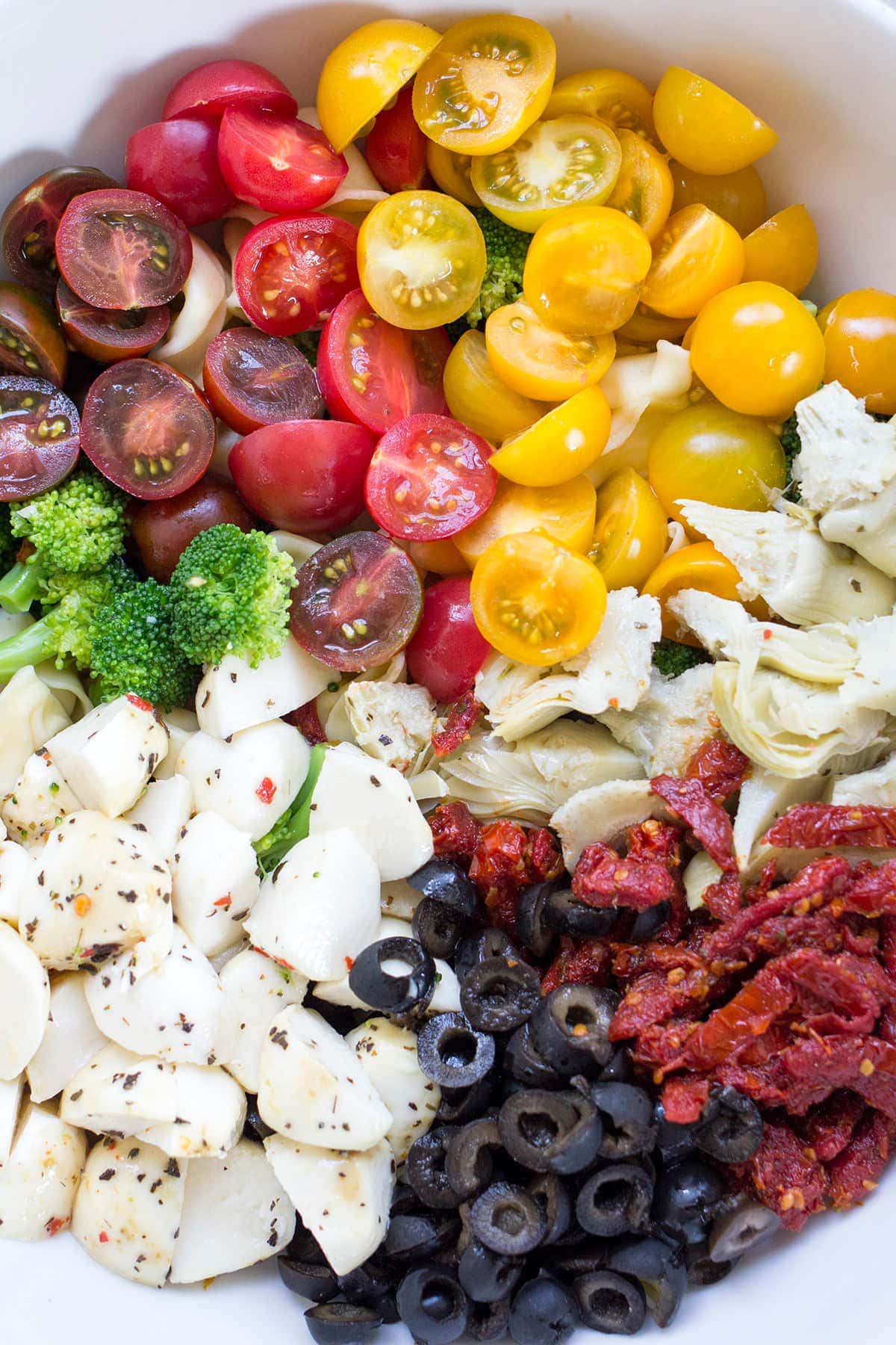 Easy Tortellini Pasta Salad with Sundried Tomatoes and Artichoke Hearts