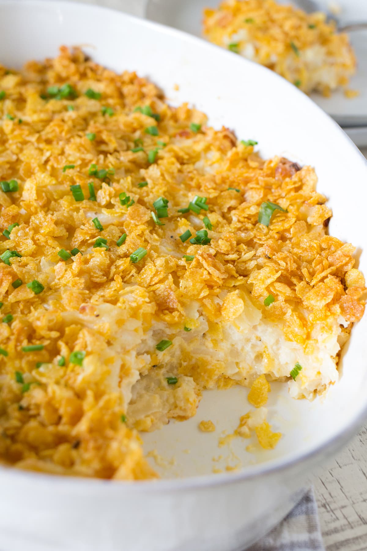 A homemade family recipe for Grandmas Cheesy Hashbrown Casserole made without any creamed soup in a can! Plus the easy recipe for cream of chicken soup substitute. This side dish is perfect for Easter.