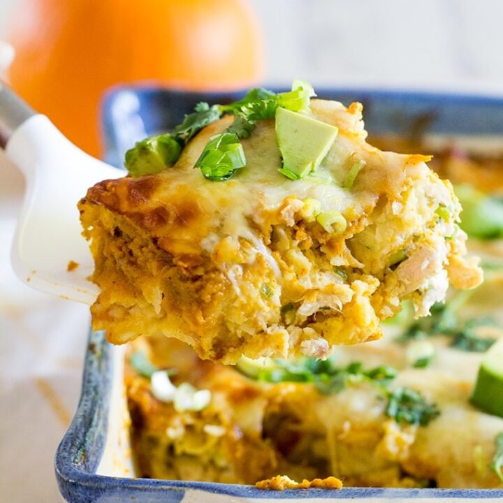 Pumpkin Chicken Enchiladas with a Pumpkin Enchilada Sauce make an easy and delicious family weeknight or weekend dinner perfect for fall. #enchiladas #pumpkin #chickenenchiladas #pumpkinenchiladas #enchiladasauce #glutenfree #glutenfreeenchiladas #pumpkinspice #dinner #weeknightdinner #easydinner #rotisseriechicken