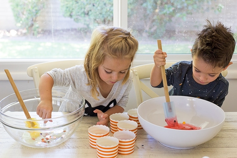 Toddler Safe Halloween Glitter Slime Recipe only has 3 Ingredients and no Borax so it's worry free for kids. Great for sensory play, preschool, or kindergarten classrooms. Mess free and quick to make for ages 3 and up. #Slime #BakingSoda #Glue #ContactLenses #Goo #Solutions #Glitter #Magic #Craft #Kids #KidsCraft #SlimeRecipe #Diy #Activities