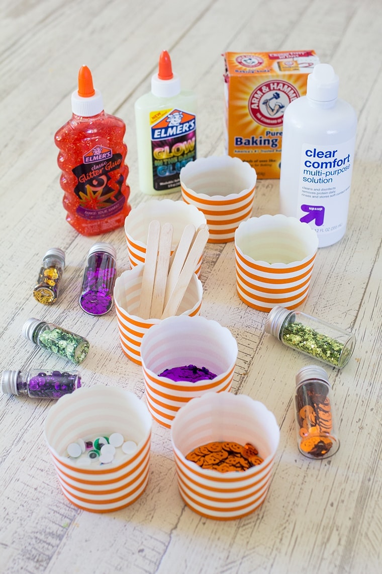 Toddler Safe Halloween Glitter Slime Recipe only has 3 Ingredients and no Borax so it's worry free for kids. Great for sensory play, preschool, or kindergarten classrooms. Mess free and quick to make for ages 3 and up. #Slime #BakingSoda #Glue #ContactLenses #Goo #Solutions #Glitter #Magic #Craft #Kids #KidsCraft #SlimeRecipe #Diy #Activities #KidsStuff