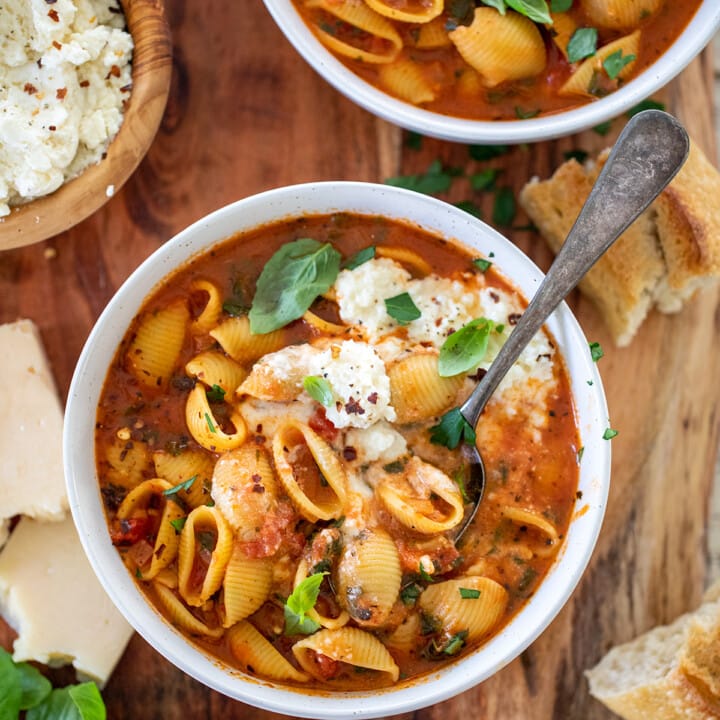 Stuffed Shells Soup turns the classic flavors of Spinach and Ricotta Stuffed Shells into the coziest bowl of soup. #stuffedshells #soup