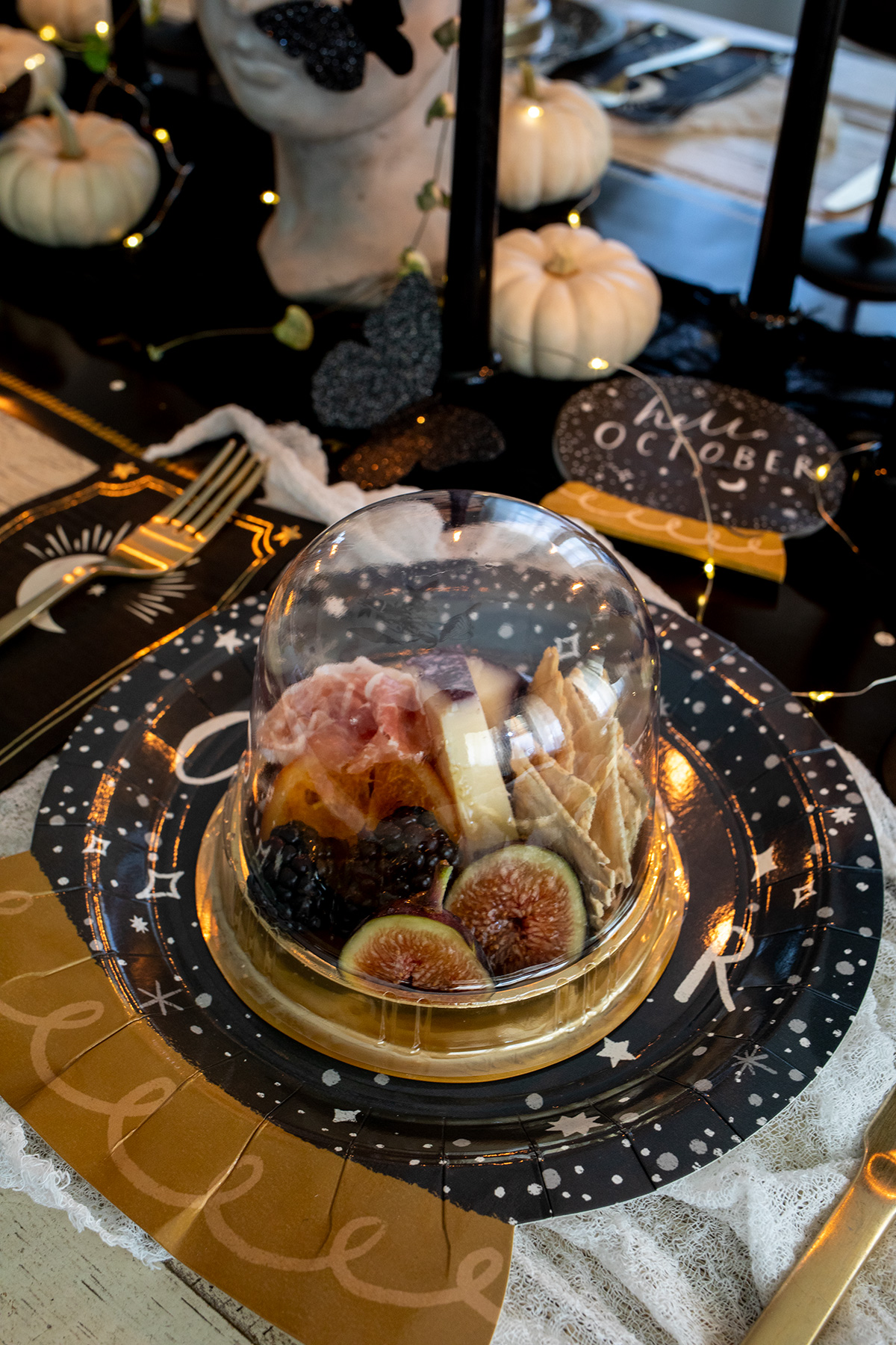 A Mystical Halloween Table with mini domed charcuterie