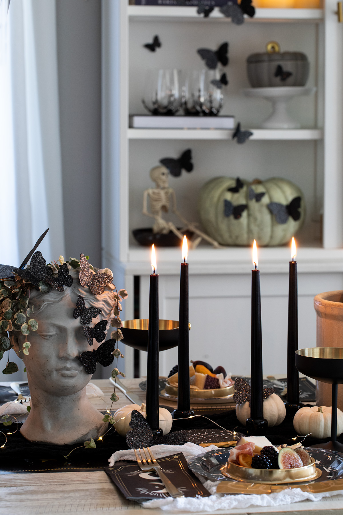 A Mystical Halloween Table with mini domed charcuterie