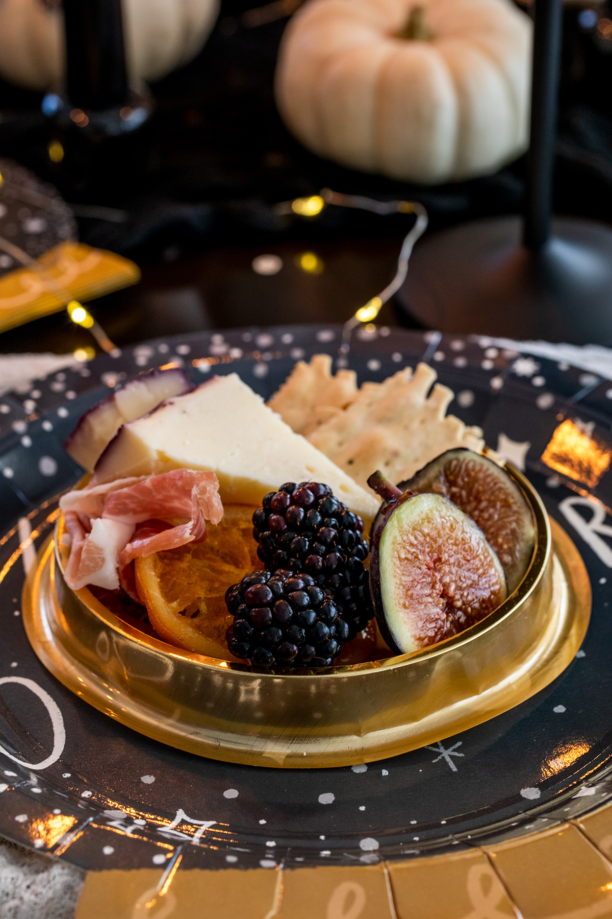 A Mystical Halloween Table with mini domed charcuterie