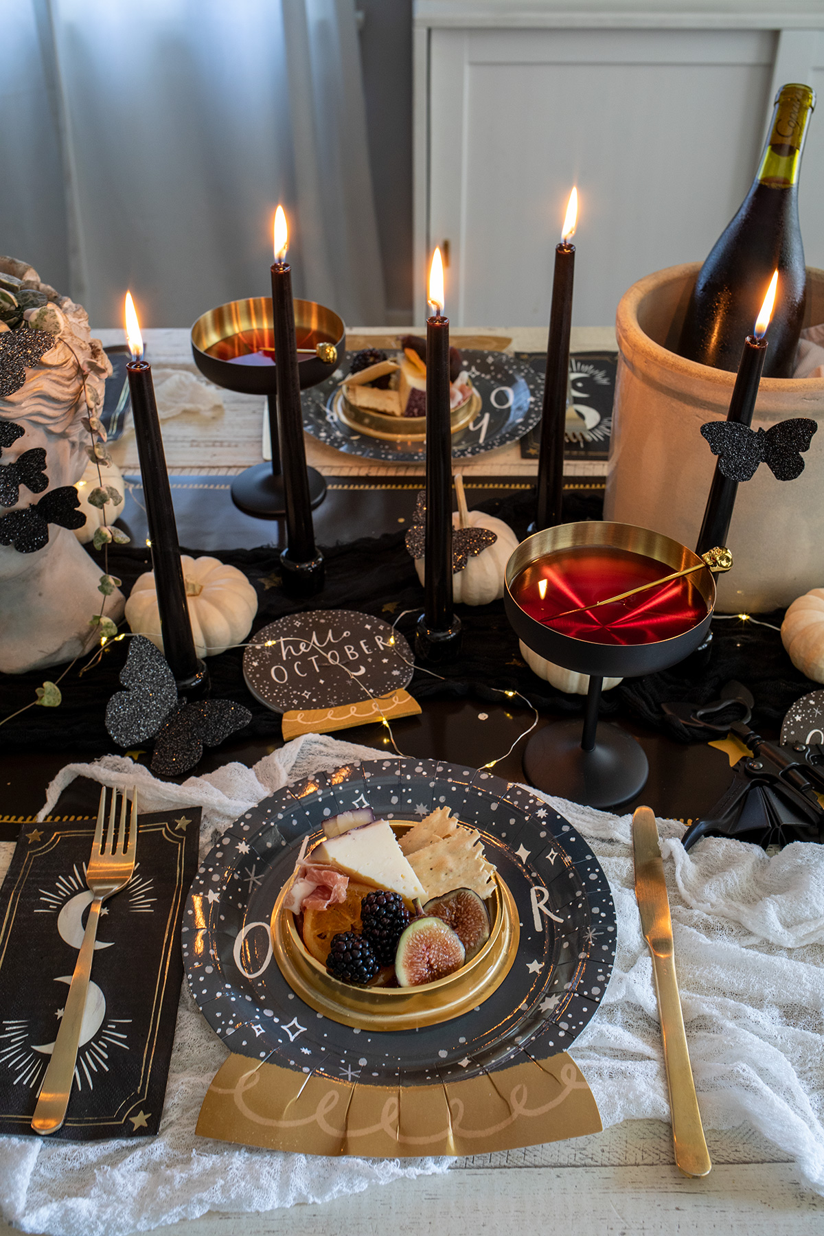 A Mystical Halloween Table with mini domed charcuterie