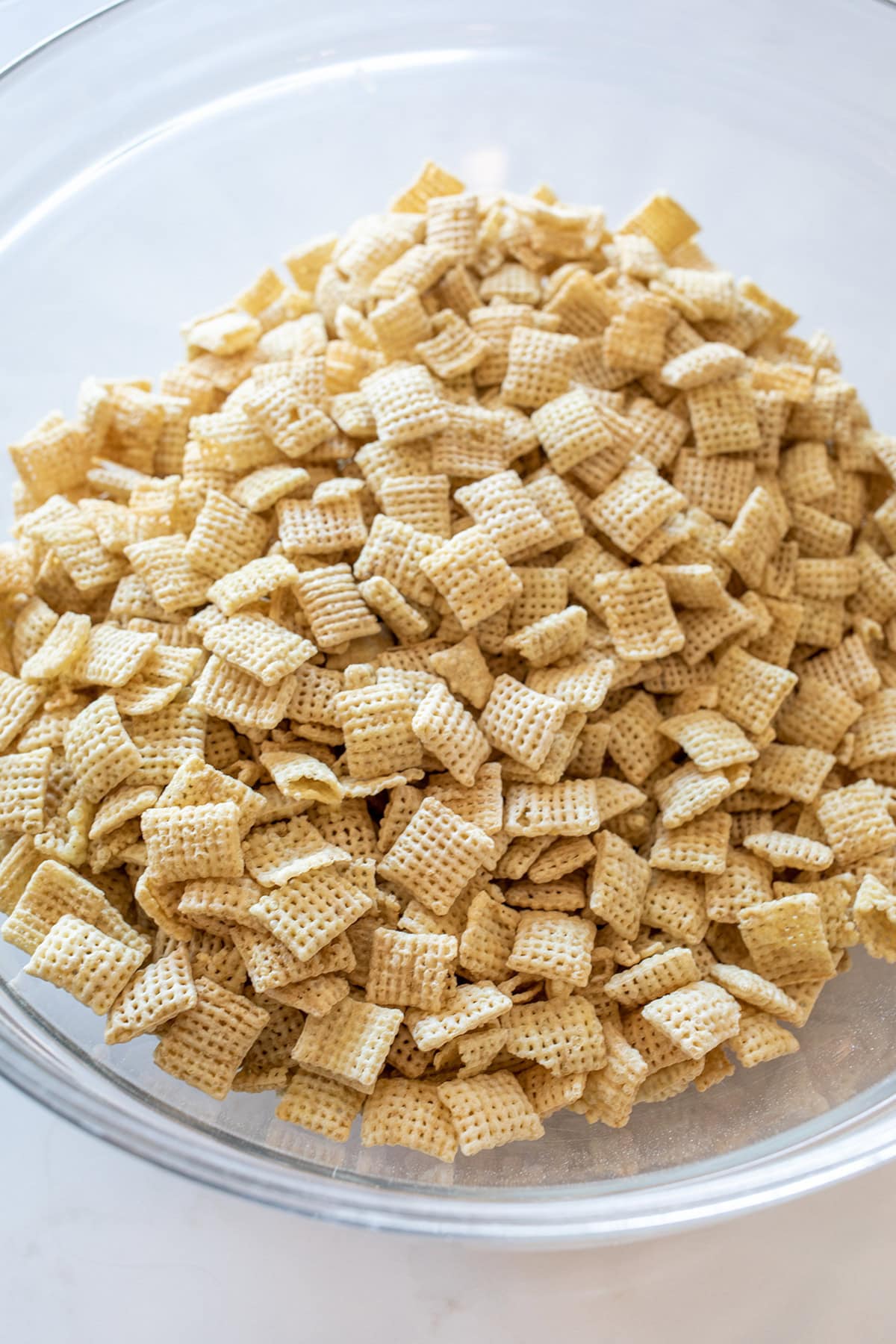 Rice Chex Mix Cereal in a glass bowl.